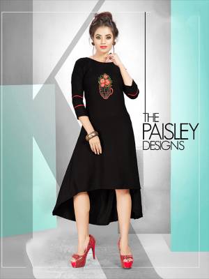 For A Bold And Beautiful Look, Grab This Readymade Designer Kurti In Black Color Fabricated On Rayon. It Is Beautified With Pretty Subtle Work. Buy This Kurti Now.