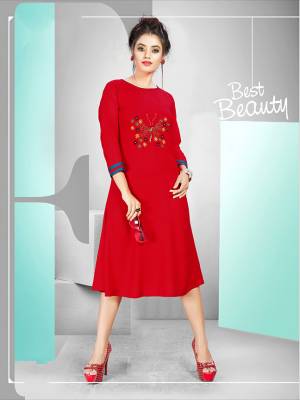 Grab This Beautiful Long Kurti For Your Semi-Casuals In Red Color. This Readymade Kurti Is Fabricated On Rayon Beautified With Butta Work. Also It IS Available In All Regular Sies. 