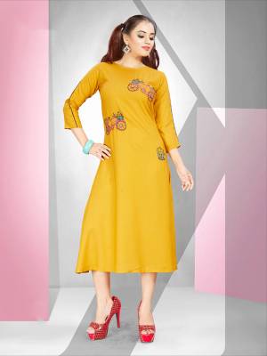 Look Pretty In This Designer Readymade Straight Kurti In Yellow Color Fabricated On Rayon. It Is Beautified With Pretty Resham Work Giving It A Very Pretty Look.  Also It Is Available In All Regular Sizes, choose As Per Your Comfort. 