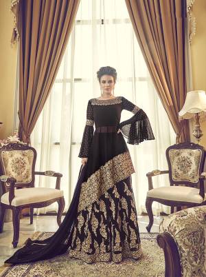 For A Bold And Beautiful Look, Grab This New And Designer Patterend Indo-Western Suit In Black. Its Top, Bottom And Dupatta Are Fabricated On Georgette Beautified With Heavy Embroidery. Buy Now.