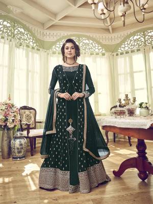 Enhance Your Personality Wearing This Designer Indo-Western Suit In Pine Green Color. Its Designer Embroidred Top Is Georgette Fabricated Paired With Santoon Bottom And Georgette Fabricated Dupatta. 