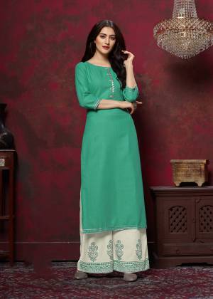 Grab This Very Pretty Designer Readymade Plazzo Set In Sea Green Colored Top Paired With Off-White Colored Bottom. This Kurti And Plazzo Are Fabricated On Cotton And Available In All Regular Sizes. Buy This Pretty Pair Now.