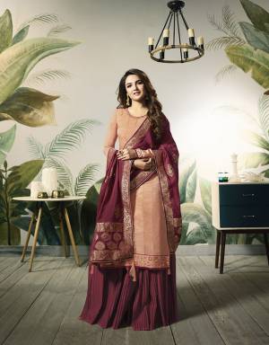 Add This Very Pretty Designer Indo-Western Suit To Your Wardrobe?For The Upcoming Festive And Wedding Season. Its Dark Peach Colored Top Is Fabricated On Satin Silk Paired With Contrasting Maroon Colored Bottom And Dupatta. Its Bottom Is Fabricated On Santoon Paired With Jacquard Silk Fabricated Dupatta. Buy Now