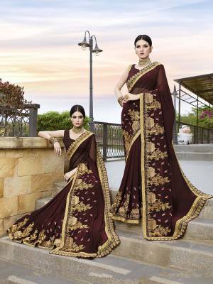 Enhance Your Personality Wearing This Very Pretty Sare In Brown Color Paired With Brown Colored Blouse, This Saree Is Fabricated On Georgette Paired With Art Silk Fabricated Blouse. It Is Beautified With Minimal Attractive Embroidery. 