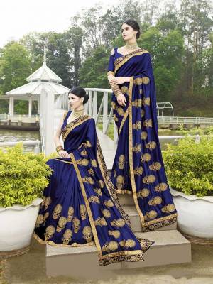 Bright And Visually Appealing Color Is Here With This Heavy Designer Saree In Royal Blue Color Paired With Royal Blue Colored Blouse. This Saree And Blouse Are Silk Based Beautified With Attractive Embroidery. 