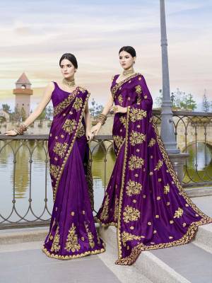 Shine Bright In This Attractively Amazing Designer Saree In Purple Color Paired With Purple Colored Blouse. This Saree And Blouse Are Silk Based Which Also Give A Rich And Elegant Look To Your Personality. 