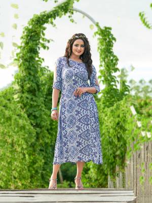 Simple And Elegant Looking Designer Readymade Kurti Is Here In Blue And White Color Fabricated On Rayon. It Is Soft Towards Skin And Easy To Carry All Day Long. 