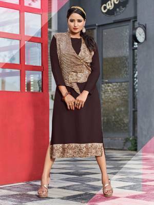 For Your Semi-Casuals, Grab This Readymade Kurti In Dark Brown Color Fabricated On Rayon. Its Unique Pattern And Color Pallete Will Earn You Lots Of Compliments From Onlookers.