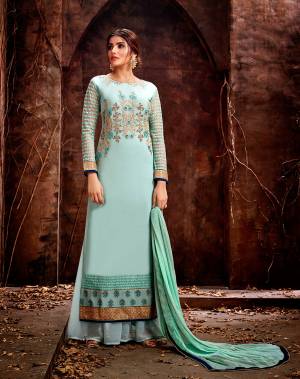 Look Pretty In This Beautiful Designer Straight Suit In All Over Aqua Blue Color. Its Top Is Georgette Based Paired With Santoon bottom And Chiffon Fabricated Dupatta. 