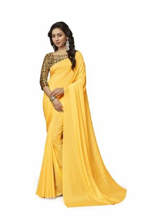 Simplicity Is The Key To Elegance, Grab This Very Pretty Simple And Elegant Looking plain Saree In Yellow Color Paired With Multi Colored Digital Printed Blouse. Both The Saree And Blouse Are Crepe Silk Based Which also Ensures Superb Comfort all Day Long. Buy Now.