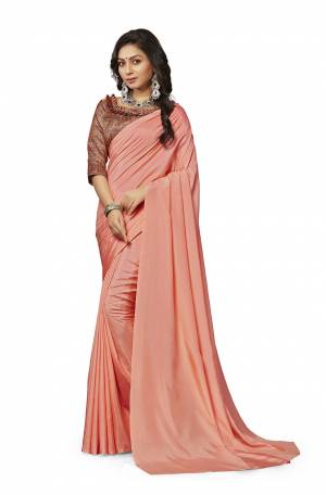 Rich And Elegant Looking Plain Saree IS Here In Dark Peach Color Paired With Multi Colored Digital Printed Blouse. This Saree And Blouse Are Fabricated On Crepe Silk Which Is Light Weight, Soft Towards Skin And Easy To Carry All Day Long. 