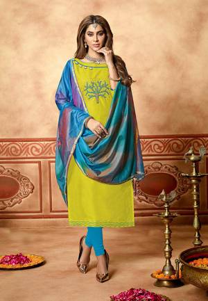 Here Is A Very Pretty Dress Material For Your Semi-Casual Wear In Light Green Color Paired With Blue Colored Bottom and Dupatta. Its Top Is Fabricated On Cotton Slub Paired With Cotton Bottom And Art Silk Dupatta. All Its Fabrics Ensures Superb Comfort All Day Long. 