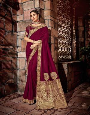 Bound in the color of magnificent Maroon and fabricated in golden motifs, this saree covers all the fundamental aspects of an Indian women's glory. 