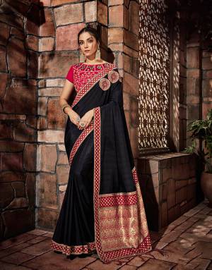 As beautiful as the night sky and as magnificent as a queen , this black saree is bewitching. The well-set geometrical and floral motifs makes this saree even more appealing. 