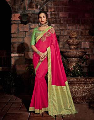 A vibrant silk saree in feminine and young shades adorned with intricate weaves in contrast colors is an essential this season. 
