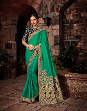 The perfect blend of multiple motifs - paisleys, geometry and florals makes this saree one of a kind. 