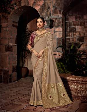 The base dusky Sand Grey hue with a regal maroon hue and a touch of gold sparks immense royalty and speaks of timelessness. 