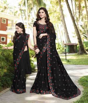 For A Bold And Beautiful Look, Grab This Designer Black Colored Saree Paired With Black Colored Blouse. This Saree Is Fabricated On Georgette Paired With Art Silk Fabricated Blouse. It Is Light In Weight And Easy To Drape.