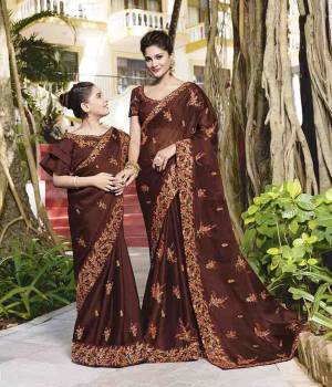 For A Bold And Beautiful Look, Grab This Designer Brown Colored Saree Paired With Brown Colored Blouse. This Saree Is Fabricated On Chiffon Paired With Art Silk Fabricated Blouse. It Is Light In Weight And Easy To Drape.