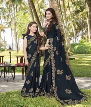 For A Bold And Beautiful Look, Grab This Designer Navy Blue Colored Saree Paired With Navy Blue Colored Blouse. This Saree Is Fabricated On Chiffon Paired With Art Silk Fabricated Blouse. It Is Light In Weight And Easy To Drape.
