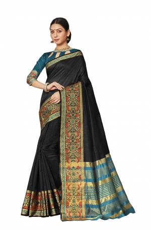 Grab This Rich And Elegant Looking Silk Based Saree In Black Color Paired With Contrasting Blue Colored Blouse. This Saree And Blouse Are Fabricated On Art Silk Beautified With Weave Lace Border. Buy Now.
