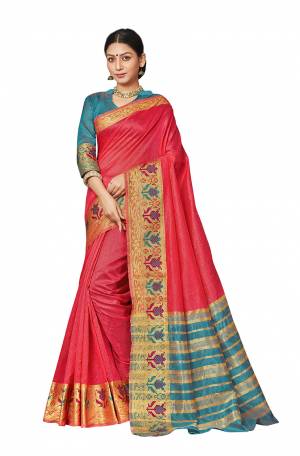 Celebrate This Festive Season With Beauty And Comfort Wearing This Designer Silk Based Saree In Fuschia Pink Color Paired With Contrasting Blue Colored Blouse. This Saree And Blouse are Fabricated On Art Silk Beautified With Weaved Border. 
