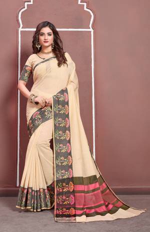 Simple And Elegant Looking Designer Silk Based Saree Is Here In Cream Color Paired With Cream Colored Blouse, It IS Beautified With Contrasting Weave Over The Border Making It Attractive. 