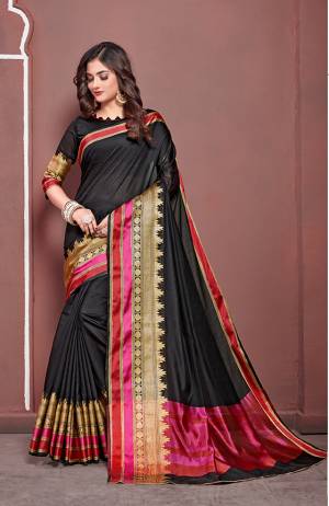 Here Is Bold And Beautiful Looking Designer Silk Based Saree In Black Color. It Is Beautified With Attractive And Bold Colored Weave Lace Border Making The Saree More Attractive. 