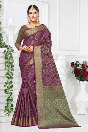 Celebrate This Festive Season With And Comfort Wearing This Heavy Weaved Designer Saree In Purple Color. This Saree And Blouse are Fabricated On Patola Art Silk Beautified With Heavy Weave All Over. 
