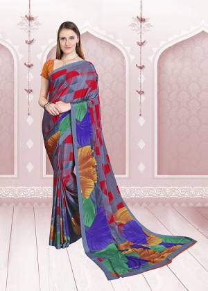 Add Some Casuals With This Pretty Saree Fabricated On Crepe. This Saree And Blouse are Beautified With prints And It Is Light Weight And Easy To Carry All Day Long. 