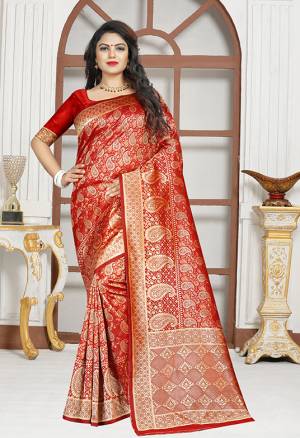 Adorn The Pretty Angelic Look In Red With This Heavy Weaved Designer Saree. This Saree And Blouse are Fabricated on Art Silk. Its Rich Fabric And Color Will Earn You Lots Of Compliments From Onlookers. 
