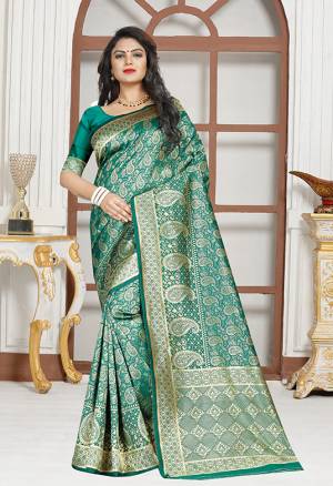 Grab This Simple And Elegent Looking Designer Silk Based Saree In Sea Green Color Paired With Sea Green Colored Blouse. This Saree Is Light Weight, Easy To Drape And Durable. Buy Now.