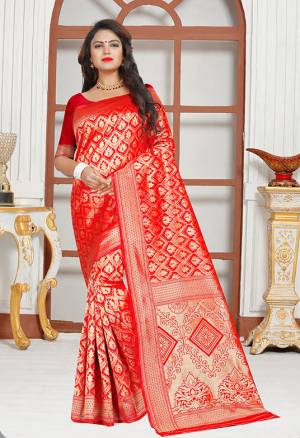 Adorn The Pretty Angelic Look In Red With This Heavy Weaved Designer Saree. This Saree And Blouse are Fabricated on Art Silk. Its Rich Fabric And Color Will Earn You Lots Of Compliments From Onlookers. 