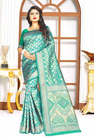 Grab This Simple And Elegent Looking Designer Silk Based Saree In Sea Green Color Paired With Sea Green Colored Blouse. This Saree Is Light Weight, Easy To Drape And Durable. Buy Now.