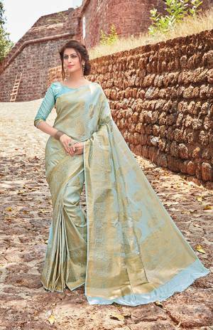 Grab This Very Beautiful Heavy Weaved Designer Silk Based Saree In Aqua Blue Color. This Pretty Saree Is Fabricated On Jacquard Silk Paired With Art Silk Fabricated Blouse. This Saree Is Suitable For Any Festive Wear Or Social Function.