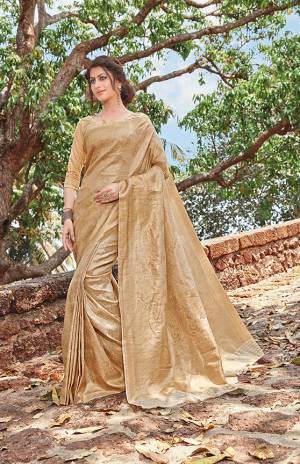 Grab This Very Beautiful Heavy Weaved Designer Silk Based Saree In Beige Color. This Pretty Saree Is Fabricated On Jacquard Silk Paired With Art Silk Fabricated Blouse. This Saree Is Suitable For Any Festive Wear Or Social Function.