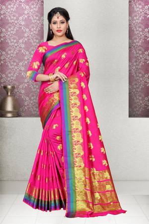 Bright And Visually Appealing Color Is Here With This Designer Silk Based Saree In Rani Pink Color Paired With Rani Pink Colored Blouse. This Saree And Blouse Fabricated On Cotton Silk Beautified With Weave. This Saree Is Light In Weight And Easy To Carry All Day Long. 