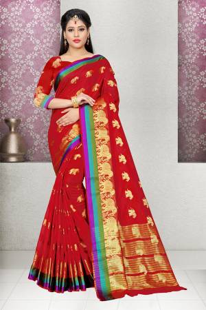 Adorn The Pretty Angelic Look Wearing This Designer Saree In Attractive Red Color Paired With Red Colored Blouse. This Saree And Blouse are Cotton Silk Based Beautified With Weave All Over. It Is Suitable For Festive Wear Or Any Social Gatherings. 