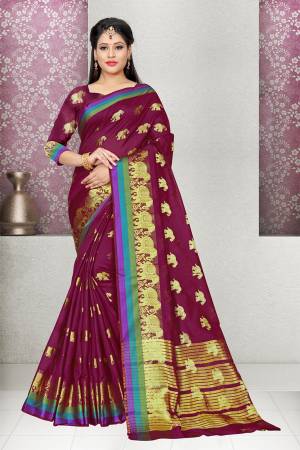 Add This Lovely Shade To Your Wardrobe With This Designer Cotton Silk Based Saree In Purple Color Paired With Purple Colored Blouse. It Is Light Weight, Easy To Drape And Carry All Day Long. 