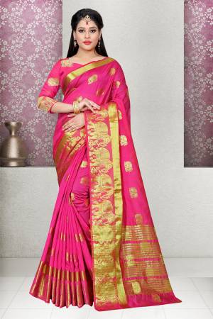 Bright And Visually Appealing Color Is Here With This Designer Silk Based Saree In Rani Pink Color Paired With Rani Pink Colored Blouse. This Saree And Blouse Fabricated On Cotton Silk Beautified With Weave. This Saree Is Light In Weight And Easy To Carry All Day Long. 