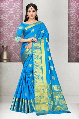 Add This Lovely Shade To Your Wardrobe With This Designer Cotton Silk Based Saree In Blue  Color Paired With Blue Colored Blouse. It Is Light Weight, Easy To Drape And Carry All Day Long. 