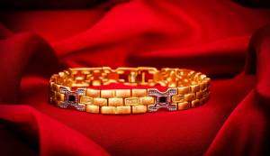 Give An Elegant Look To Your Wrist Wearing This Designer Bracelet In Golden Color Beautified With Stone Work. This Bracelet Can Be Paired With Any Colored And Type Of Attire, Buy Now