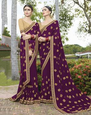 Look Beautiful Wearing This Designer Saree In Purple Color Paired With Beige Colored Blouse. This Saree Is Fabricated On Georgette Paired With Art Silk Fabricated Blouse. It Is Light In Weight And Easy To Carry All Day Long. 