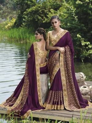 You Will Earn Lots of Compliments Wearing This Designer Fancy Fabric Based Designer Saree In Purple Color Paired With Beige Colored Blouse. This Saree And Blouse are Beautified With Attractive Embroidery Over The Lace Border And Blouse. 