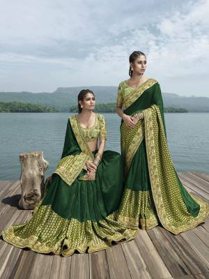 Go With The Shades Of Green With This Designer Saree In Green Color Paired With Light Green Colored Blouse. This Saree IS Fabricated On Fancy Art Silk Paired With Art Silk Fabricated Blouse. It Is Easy To Drape And Carry Throughout The Gala.