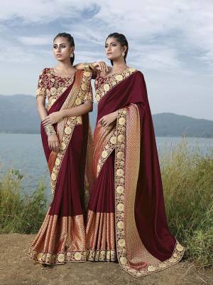 Flaunt Your Rich And Elegant Taste Wearing This Designer Saree In Maroon Color. It Is Fancy Art Silk Fabricated With Silk Base. It Has Attractive Lace Border And Embroidered Blouse Which Gives Rich look To Your Personality. 
