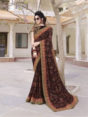 Enhance Your Personality Wearing This Heavy Designer Saree In Brown Color Paired With Brown Colored Blouse. This Saree Is Fabricated On Georgette Paired With Art Silk Fabricated Blouse. It Has Attractive Lace Border With Tone To Tone Embroidery All Over It.