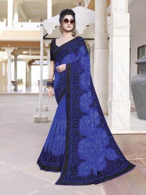Bright And Visually Appealing Color Is Here With This Designer Saree In Royal Blue Color Paired With Black Colored Blouse, This Saree Is Fabricated On Georgette Paired With Art Silk Fabricated Blouse. Buy Now.