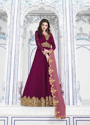 Look Beautiful In Shades Of Pink With This Designer Floor Length Suit In Magenta Pink Color Paired With Pink Colored Dupatta. Its Top And Dupatta Are Georgette Based Paired With Santoon Bottom. This Suit Is Light In Weight And Easy To Carry Throughout The Gala.