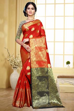 Grab This Beautiful Designer Silk Based Saree In Red Color Paired With Contrasting Black Colored Blouse. This Saree And Blouse Are Fabricated On Art Silk Beeautified With Weave Motifs All Over The Saree. This Saree Is Durable, Light Weight And Easy To Carry All Day Long. 